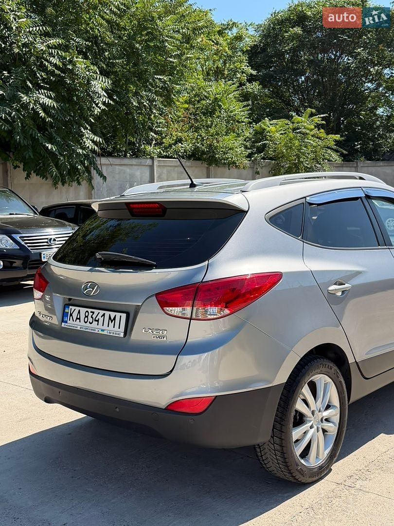 Hyundai Tucson 2012 VIN KMHJU81VBCU499603 фото оголошення 7 з 35