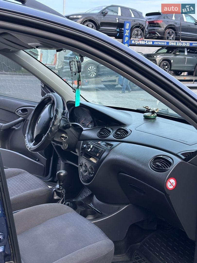 Ford Focus 2004 VIN WF0NXXGCDN4A63199 фото оголошення 13 з 21