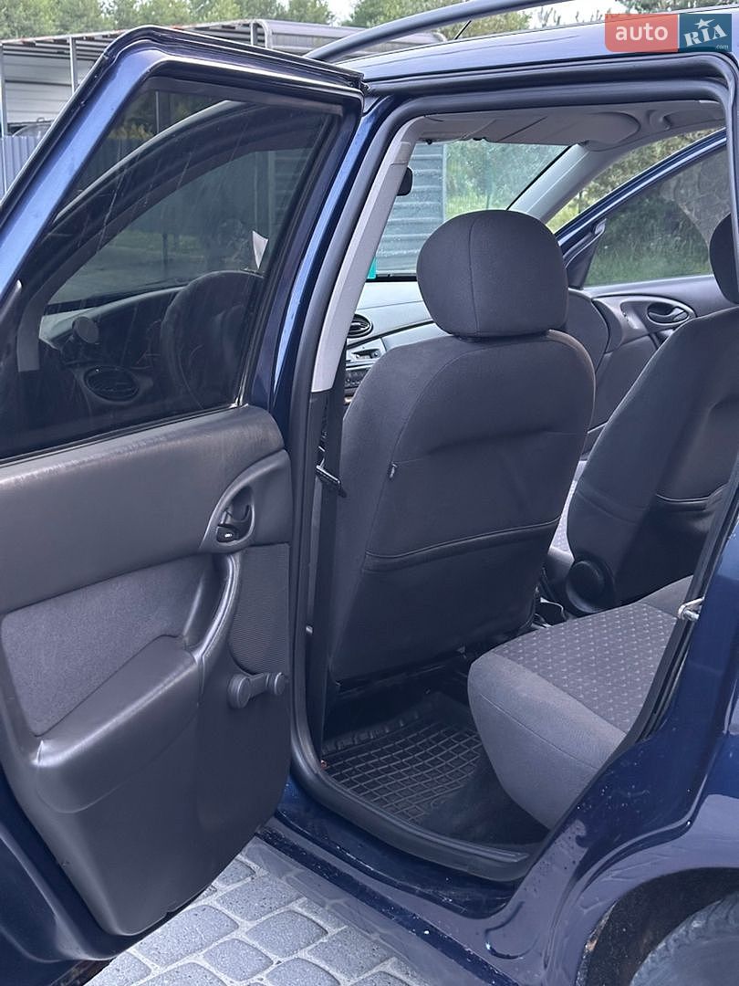 Ford Focus 2004 VIN WF0NXXGCDN4A63199 фото оголошення 17 з 21