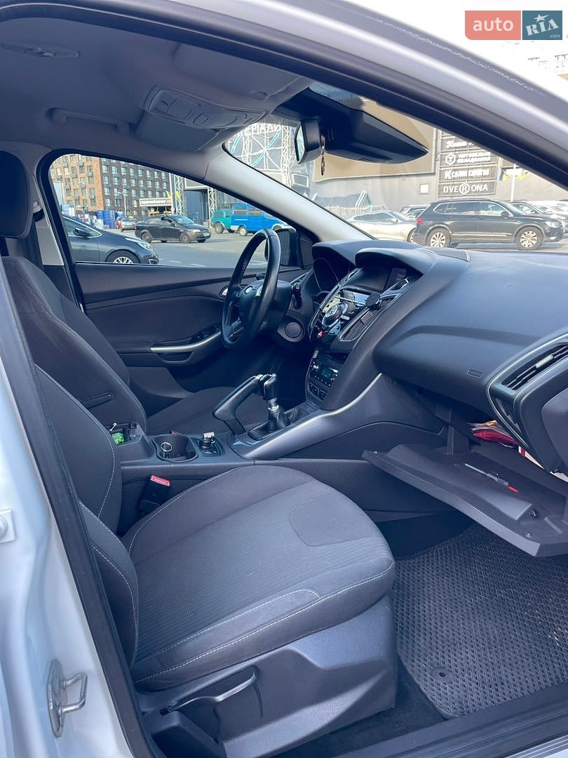 Ford Focus 2013 VIN WF0LXXGCBLDU79492 фото оголошення 8 з 25