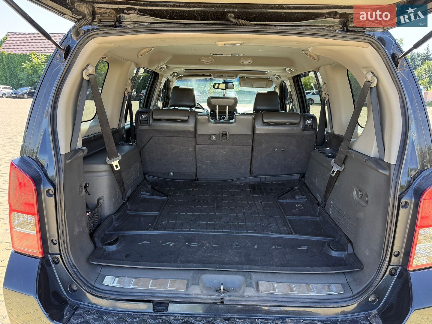 Nissan Pathfinder 2011 VIN VSKJVWR51U0413863 фото оголошення 4 з 19