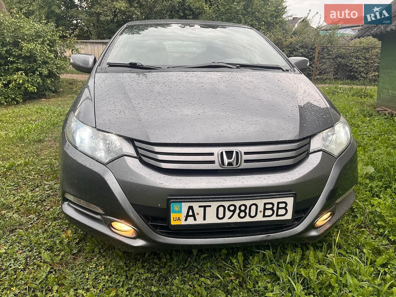 Honda Insight 2010 VIN JHMZE2870AS224731 фото оголошення 4 з 12