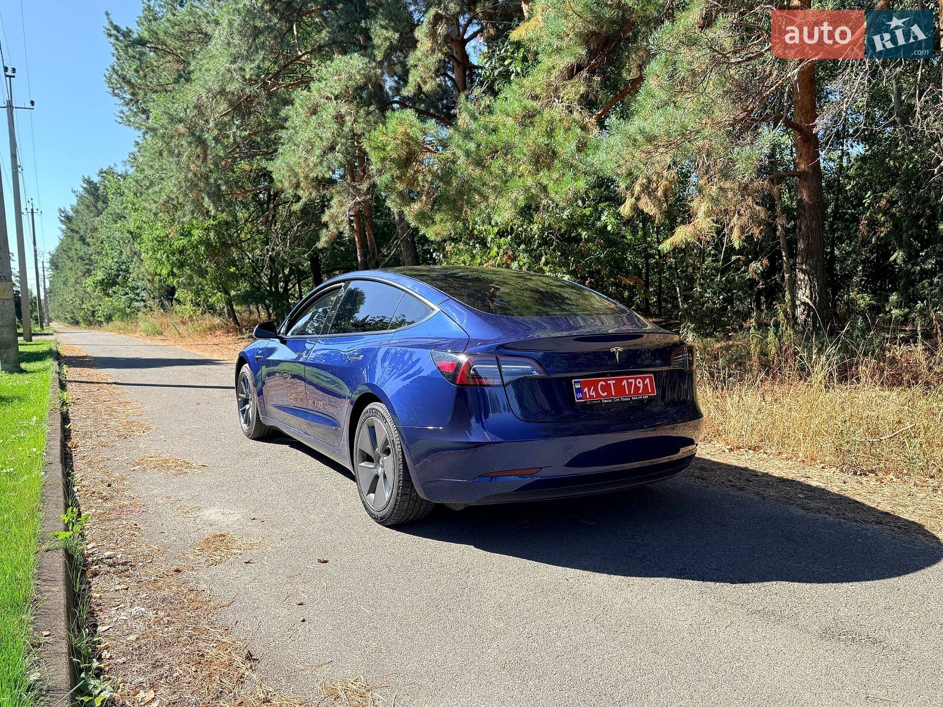 Tesla Model 3 2021 VIN 5YJ3E1EAXMF095213 фото оголошення 5 з 9