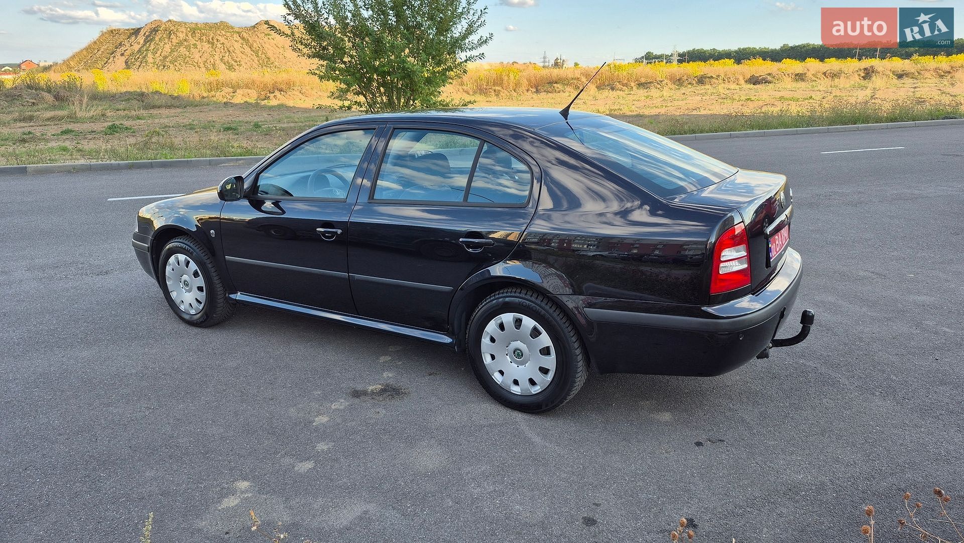Skoda Octavia 2010 VIN TMBDX41U1A8864550 фото оголошення 6 з 33