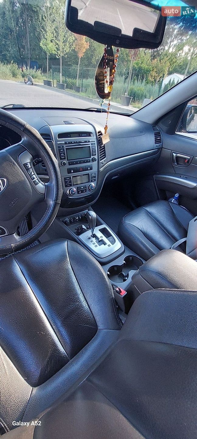 Hyundai Santa FE 2010 VIN KMHSH81XDBU689630 фото оголошення 12 з 16