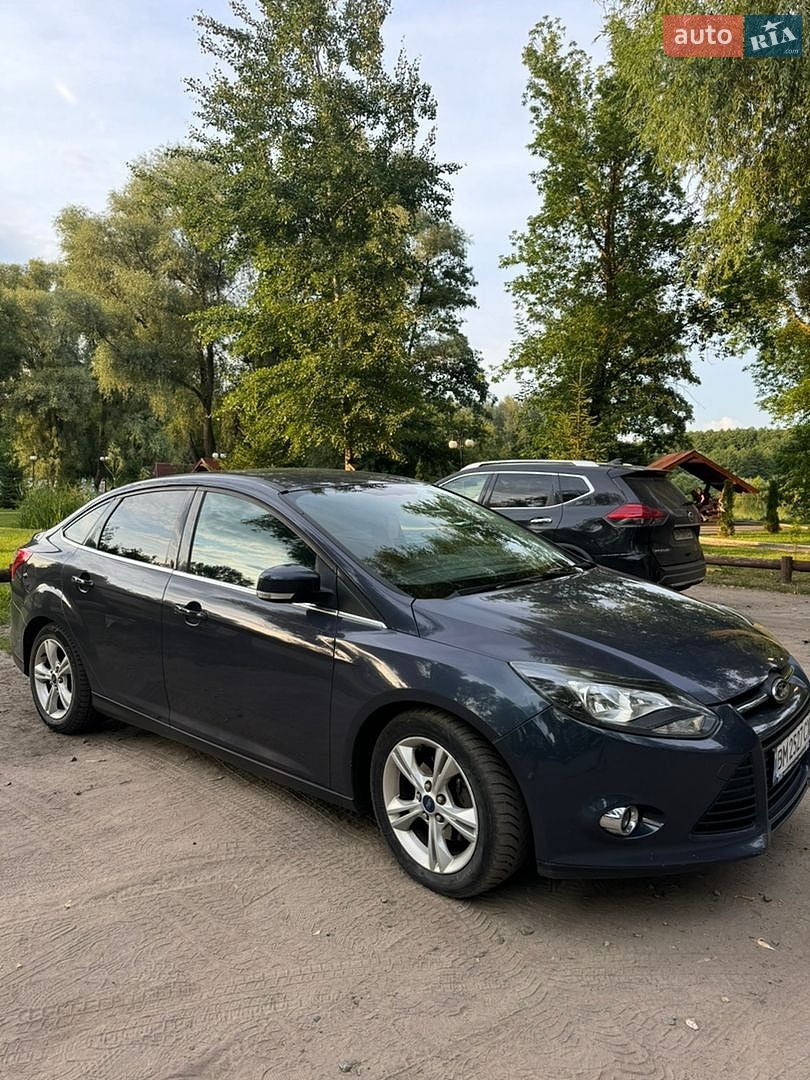 Ford Focus 2013 VIN WF0MXXGCBMDB60984 фото оголошення 5 з 6