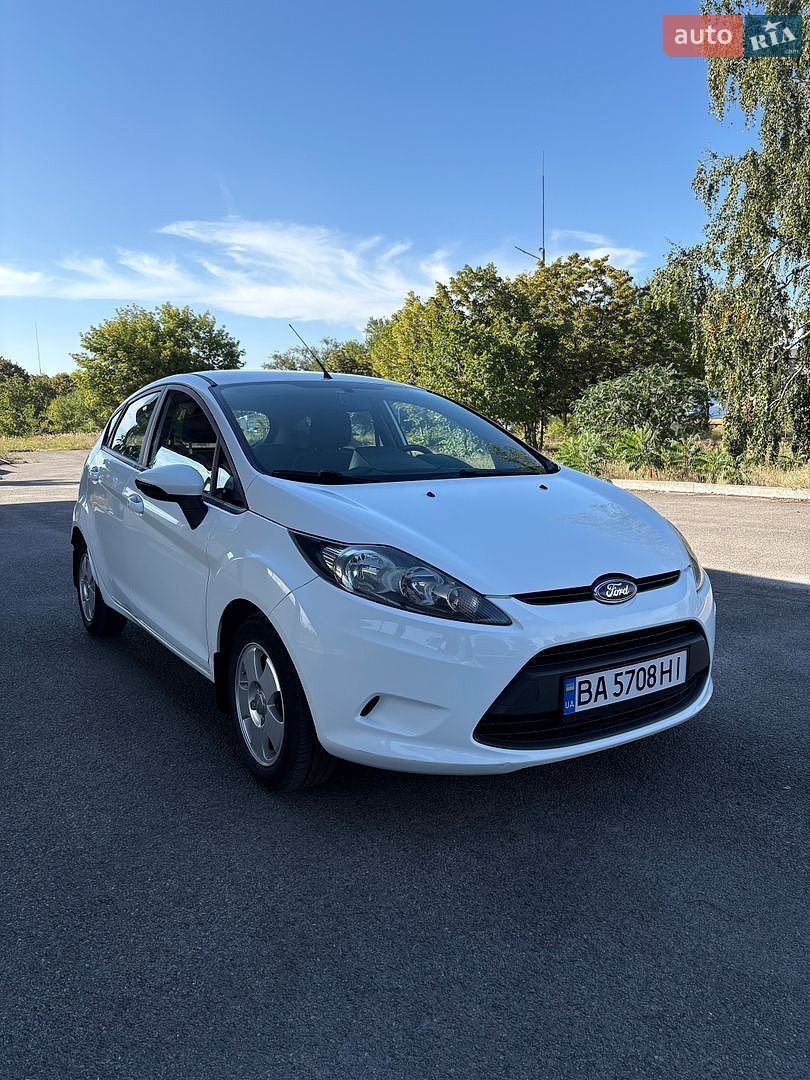 Ford Fiesta 2012 VIN WF0JXXGAJJCK14425 фото оголошення 2 з 35