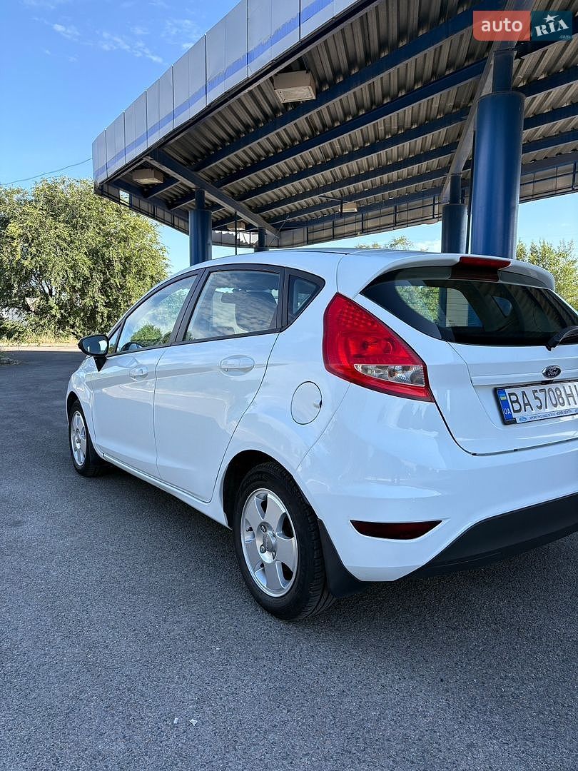Ford Fiesta 2012 VIN WF0JXXGAJJCK14425 фото оголошення 4 з 35