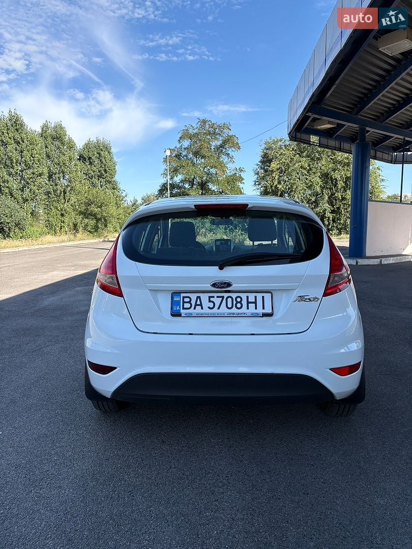 Ford Fiesta 2012 VIN WF0JXXGAJJCK14425 фото оголошення 5 з 35