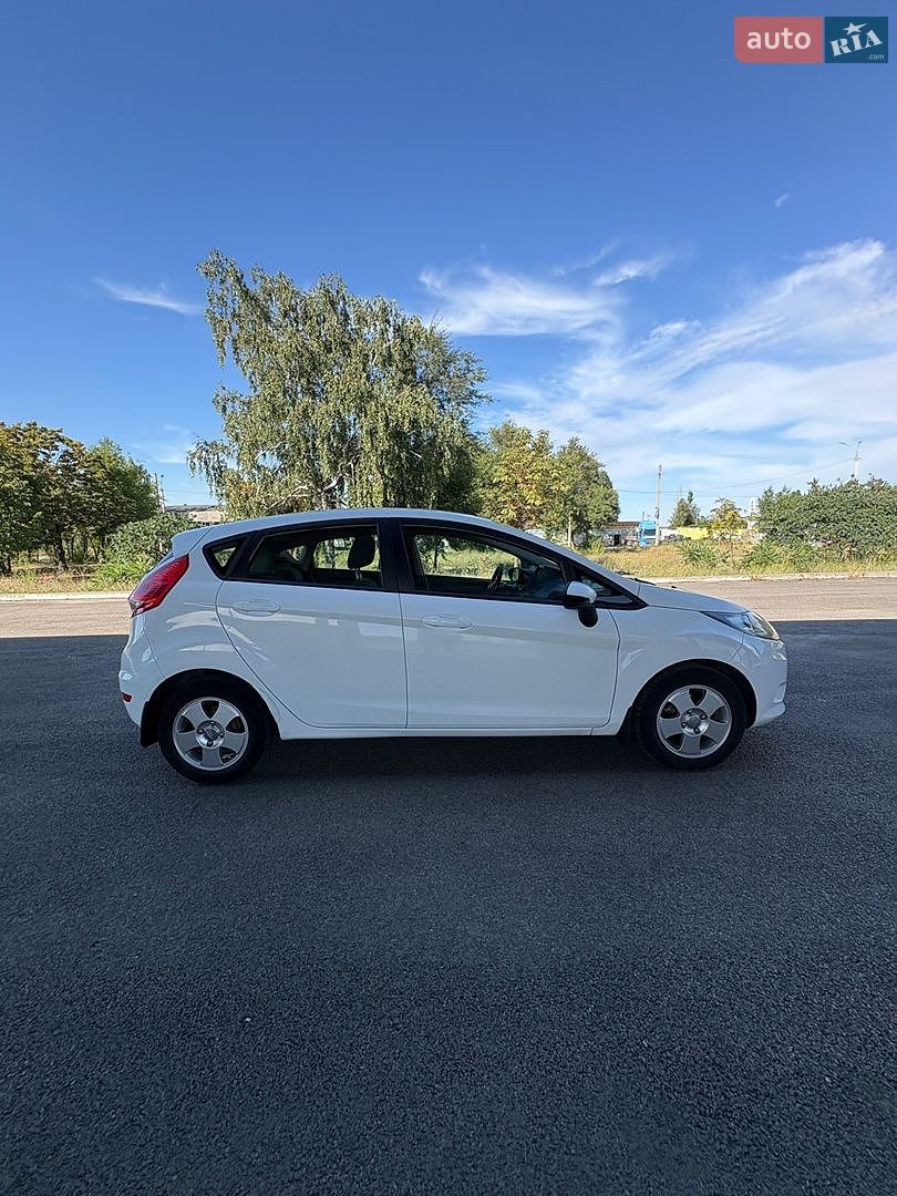 Ford Fiesta 2012 VIN WF0JXXGAJJCK14425 фото оголошення 8 з 35