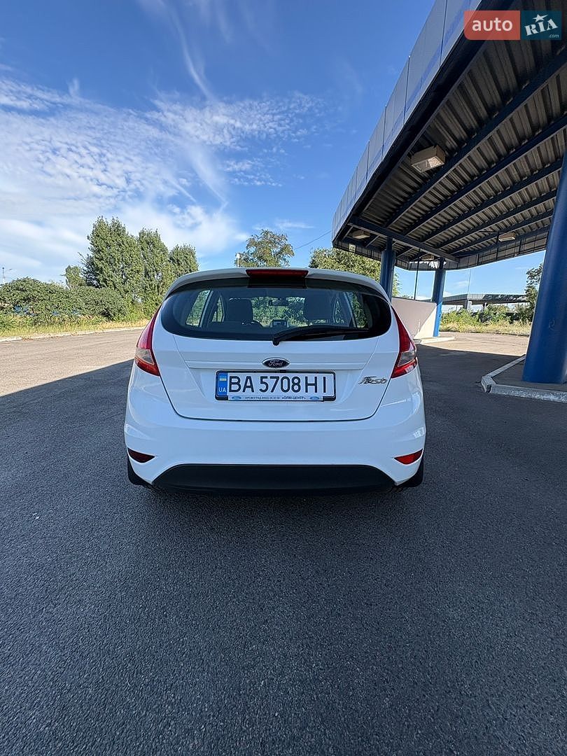 Ford Fiesta 2012 VIN WF0JXXGAJJCK14425 фото оголошення 7 з 35