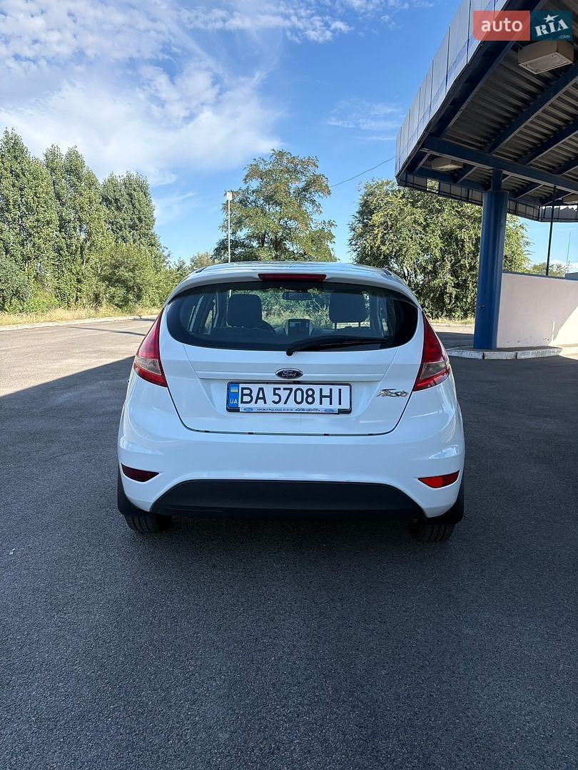Ford Fiesta 2012 VIN WF0JXXGAJJCK14425 фото оголошення 9 з 35