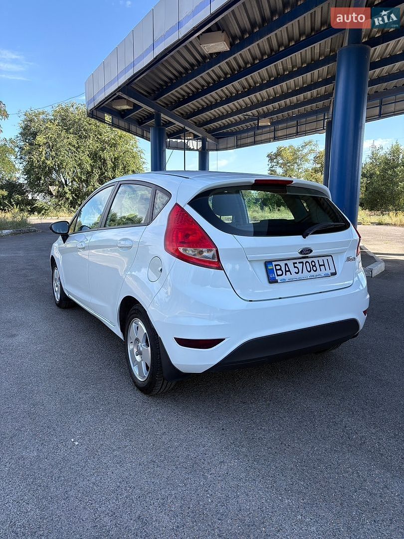 Ford Fiesta 2012 VIN WF0JXXGAJJCK14425 фото оголошення 10 з 35