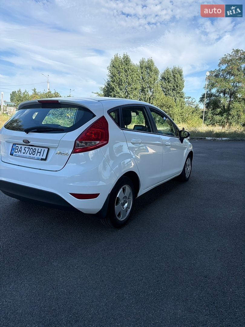 Ford Fiesta 2012 VIN WF0JXXGAJJCK14425 фото оголошення 11 з 35