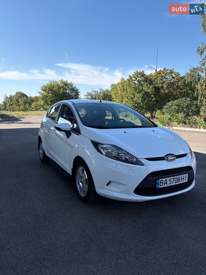 Ford Fiesta 2012 VIN WF0JXXGAJJCK14425 фото оголошення 12 з 35