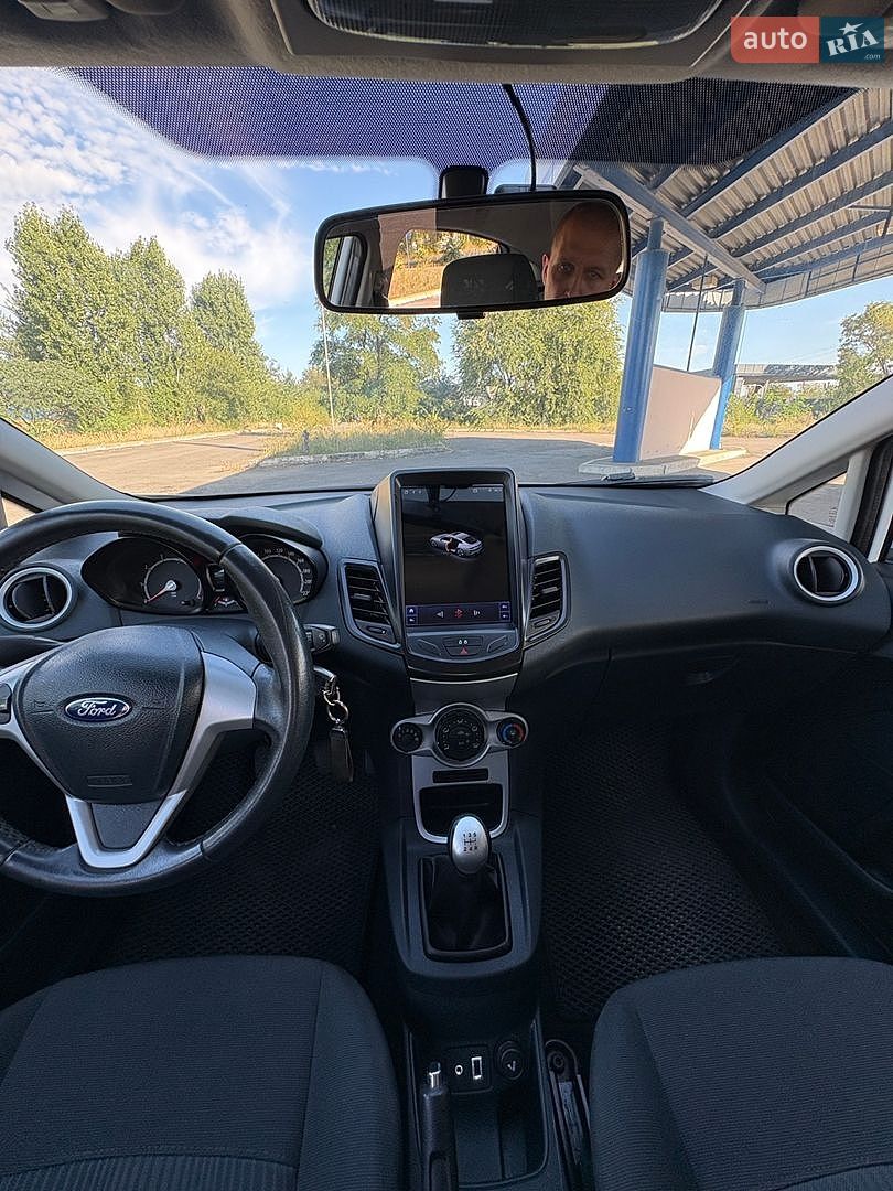 Ford Fiesta 2012 VIN WF0JXXGAJJCK14425 фото оголошення 16 з 35