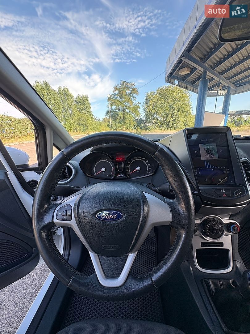 Ford Fiesta 2012 VIN WF0JXXGAJJCK14425 фото оголошення 18 з 35