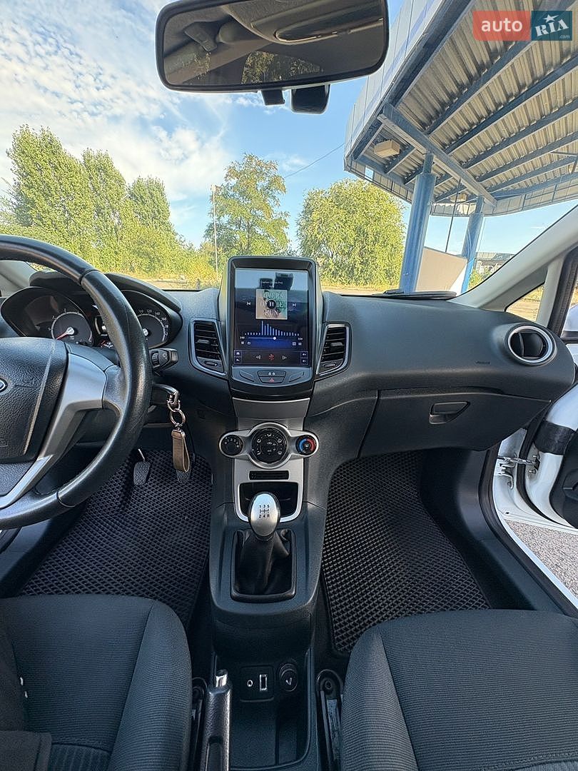 Ford Fiesta 2012 VIN WF0JXXGAJJCK14425 фото оголошення 17 з 35
