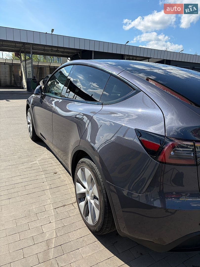 Tesla Model Y 2023 VIN LRWYGDFD4PC163417 фото оголошення 2 з 20