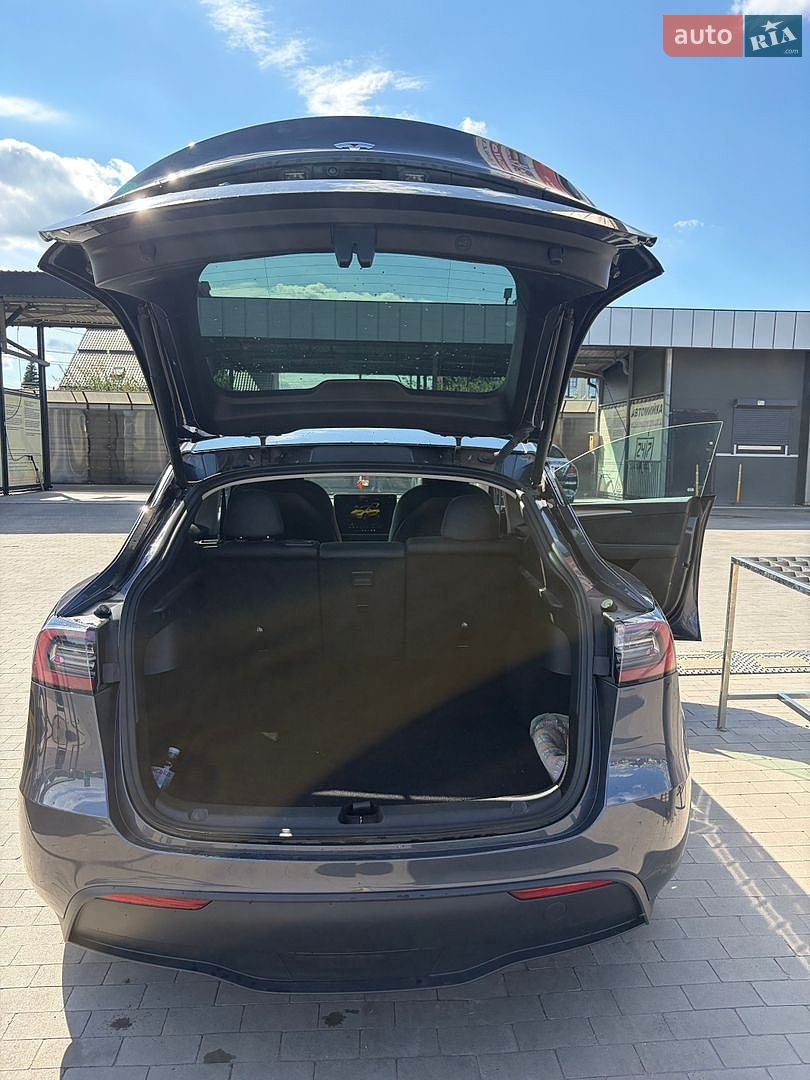 Tesla Model Y 2023 VIN LRWYGDFD4PC163417 фото оголошення 5 з 20