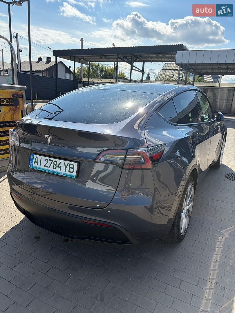 Tesla Model Y 2023 VIN LRWYGDFD4PC163417 фото оголошення 14 з 20