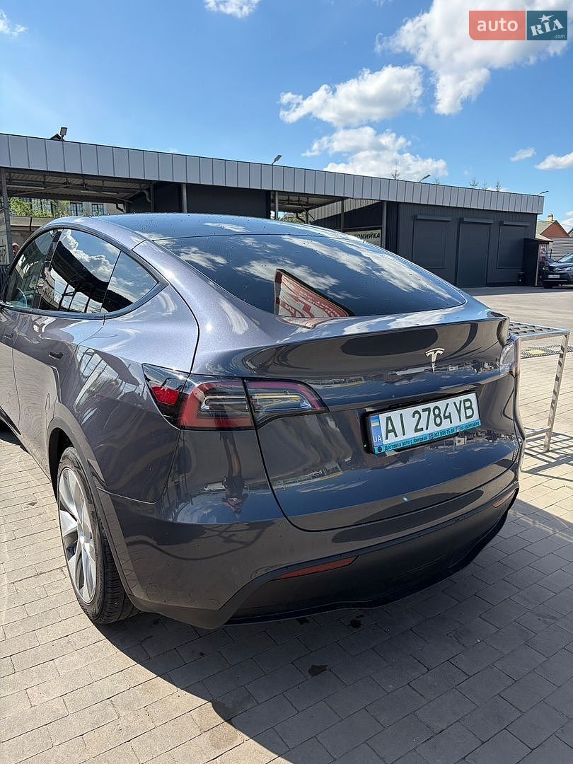Tesla Model Y 2023 VIN LRWYGDFD4PC163417 фото оголошення 16 з 20
