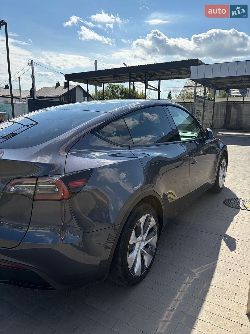 Tesla Model Y 2023 VIN LRWYGDFD4PC163417 фото оголошення 13 з 20