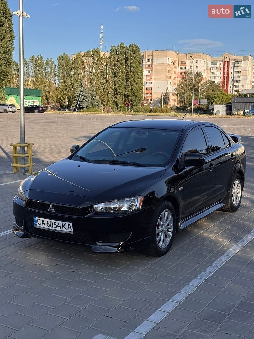 Mitsubishi Lancer 2013 VIN JA32U2FU4DU610192 фото оголошення 2 з 19
