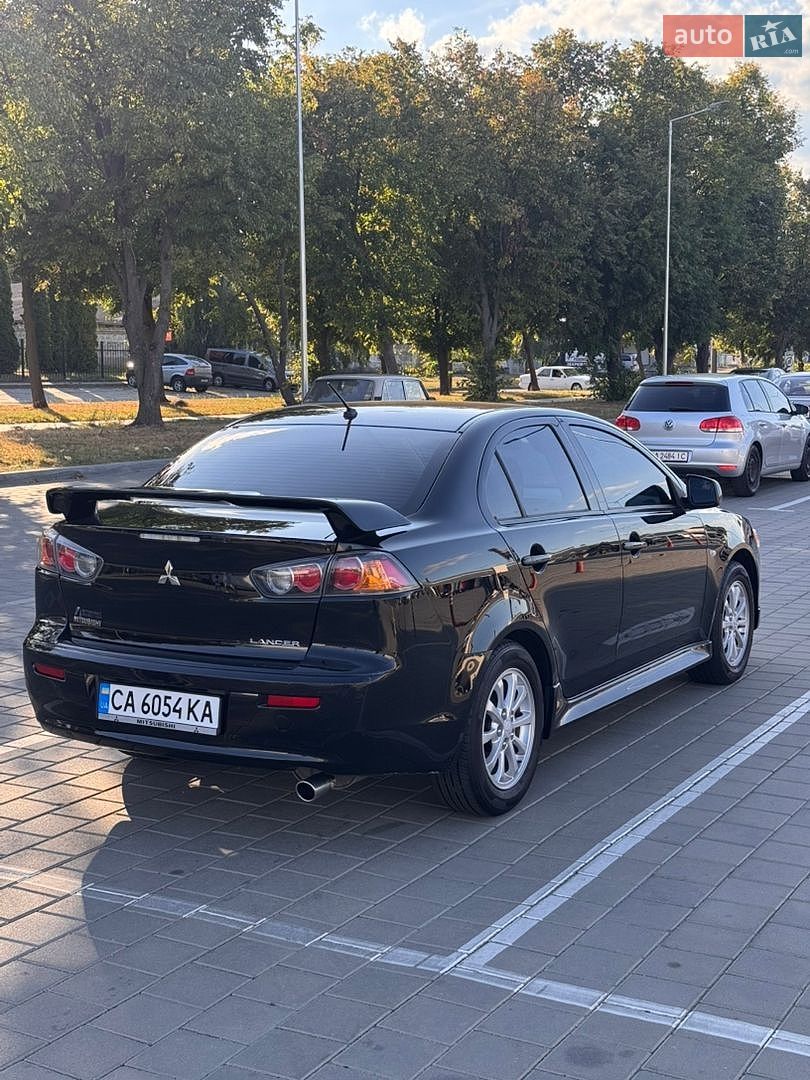 Mitsubishi Lancer 2013 VIN JA32U2FU4DU610192 фото оголошення 4 з 19