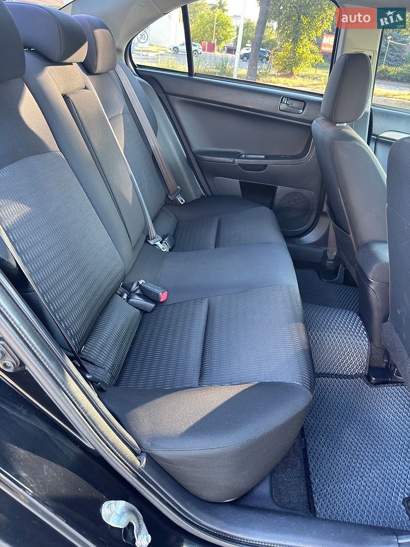 Mitsubishi Lancer 2013 VIN JA32U2FU4DU610192 фото оголошення 18 з 19