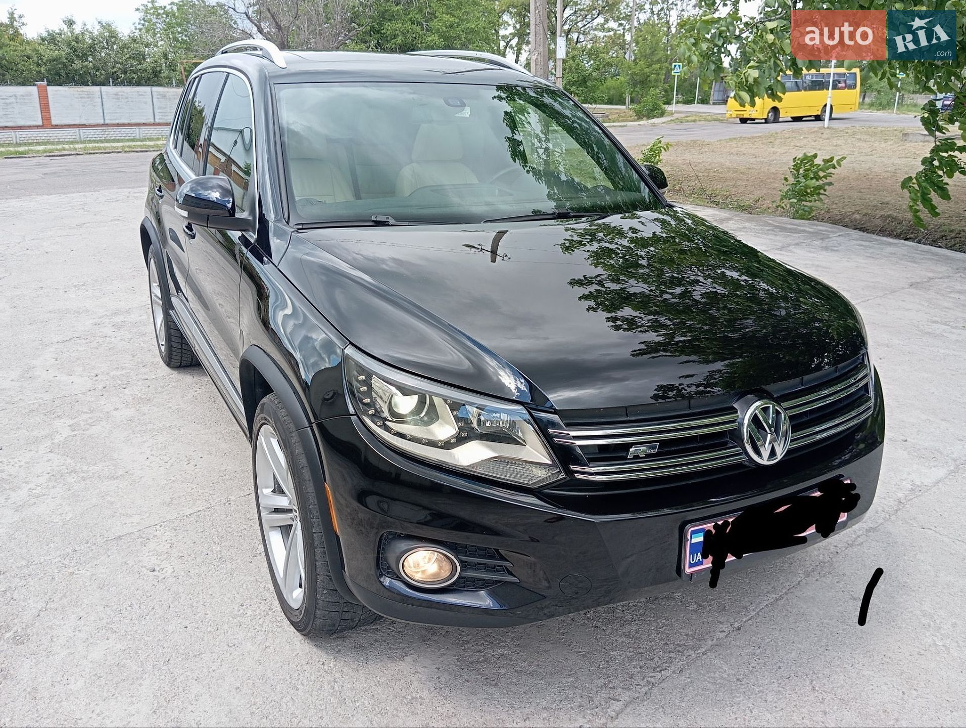 Volkswagen Tiguan 2014 VIN WVGAV7AX4FW009831 фото оголошення 3 з 22