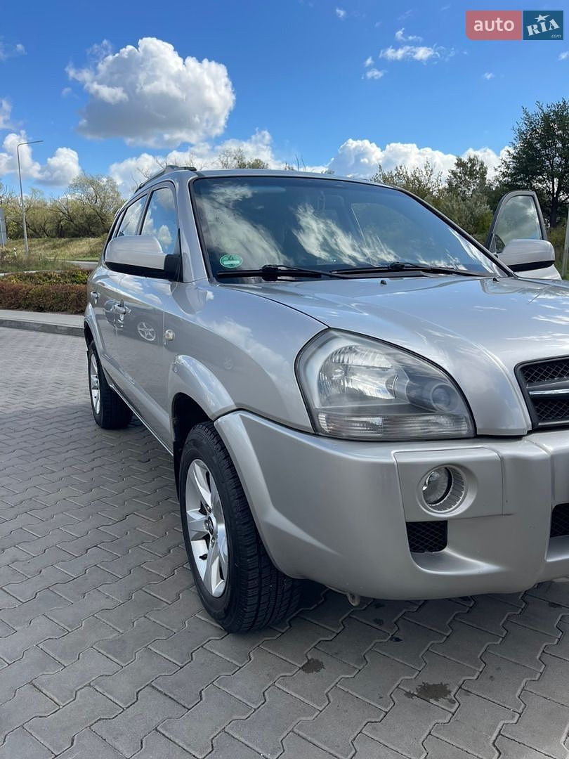 Hyundai Tucson 2008 VIN KMHJN81BP8U845631 фото оголошення 12 з 22