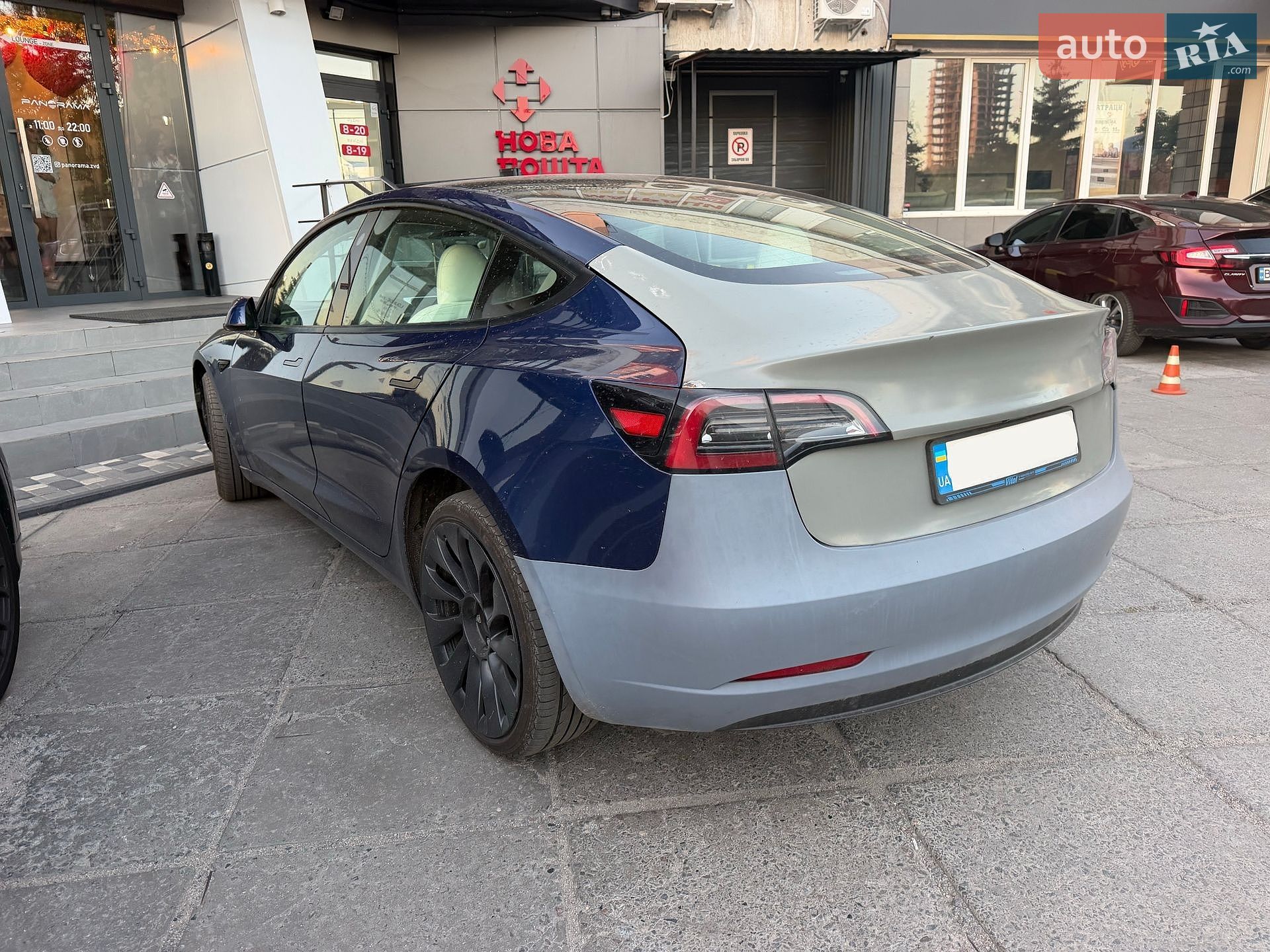 Tesla Model 3 2023 VIN 5YJ3E1EC5PF582678 фото оголошення 5 з 16