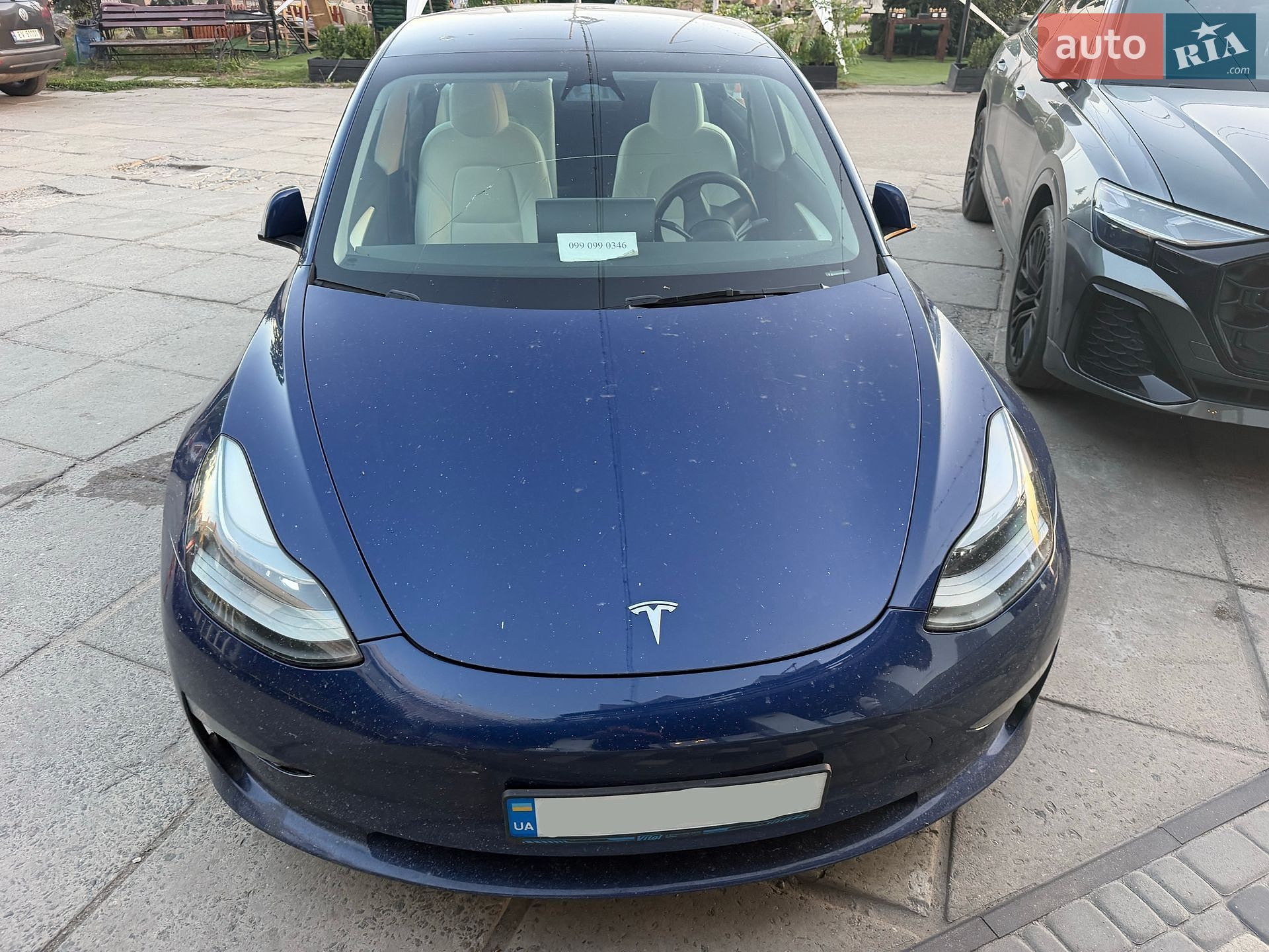 Tesla Model 3 2023 VIN 5YJ3E1EC5PF582678 фото оголошення 2 з 16