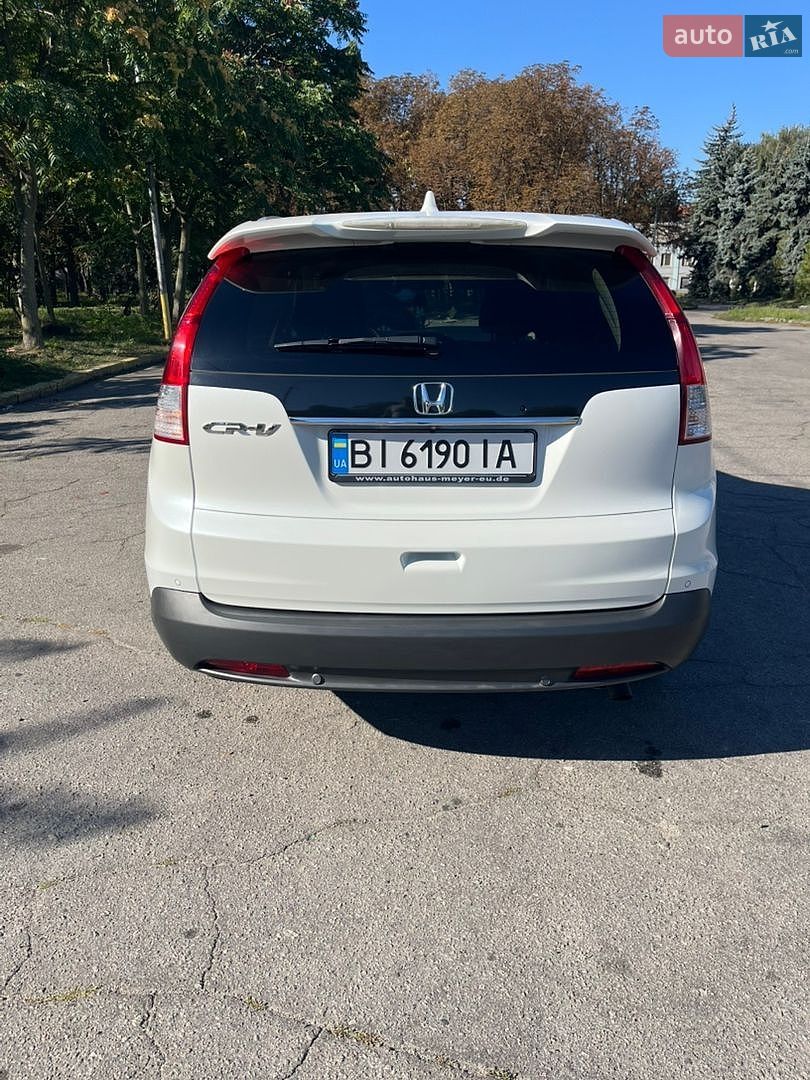 Honda CR-V 2013 VIN SHSRE6890EU002048 фото оголошення 3 з 34