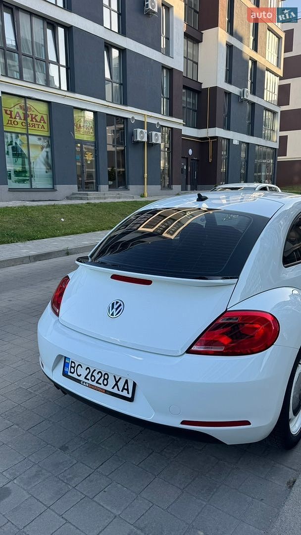 Volkswagen Beetle 2014 VIN 3VWF17ATXFM600701 фото оголошення 7 з 15