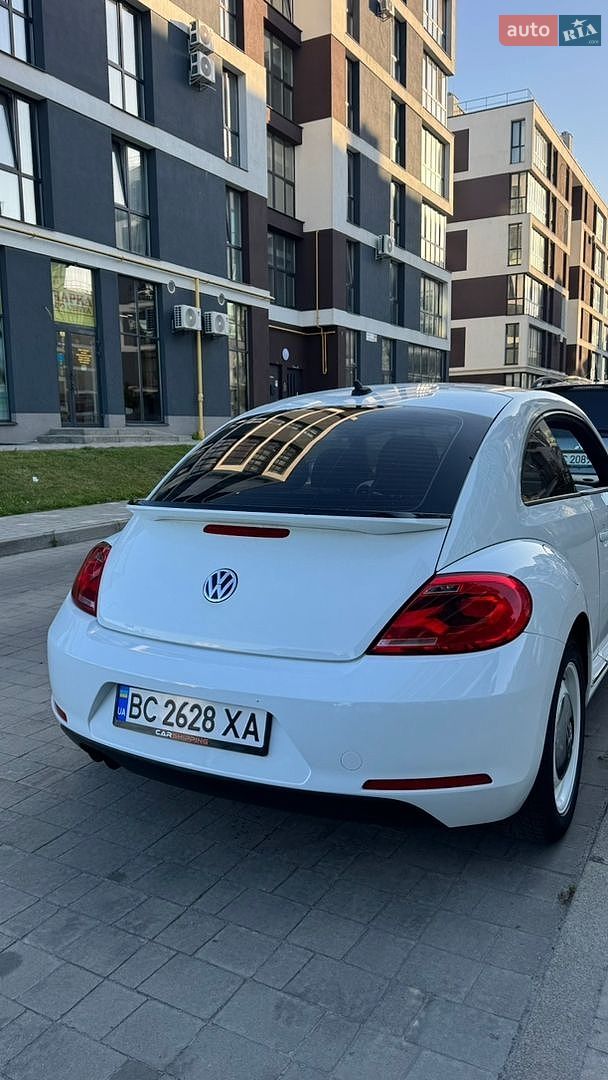 Volkswagen Beetle 2014 VIN 3VWF17ATXFM600701 фото оголошення 8 з 15