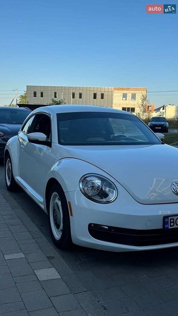 Volkswagen Beetle 2014 VIN 3VWF17ATXFM600701 фото оголошення 11 з 15