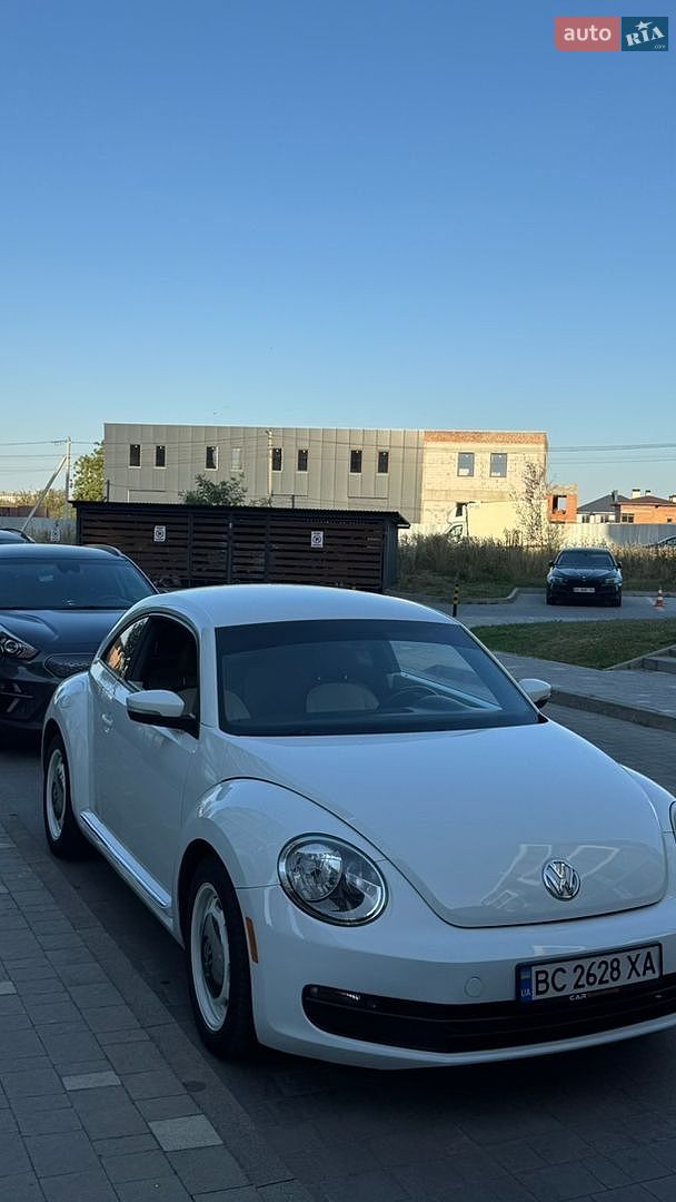 Volkswagen Beetle 2014 VIN 3VWF17ATXFM600701 фото оголошення 12 з 15