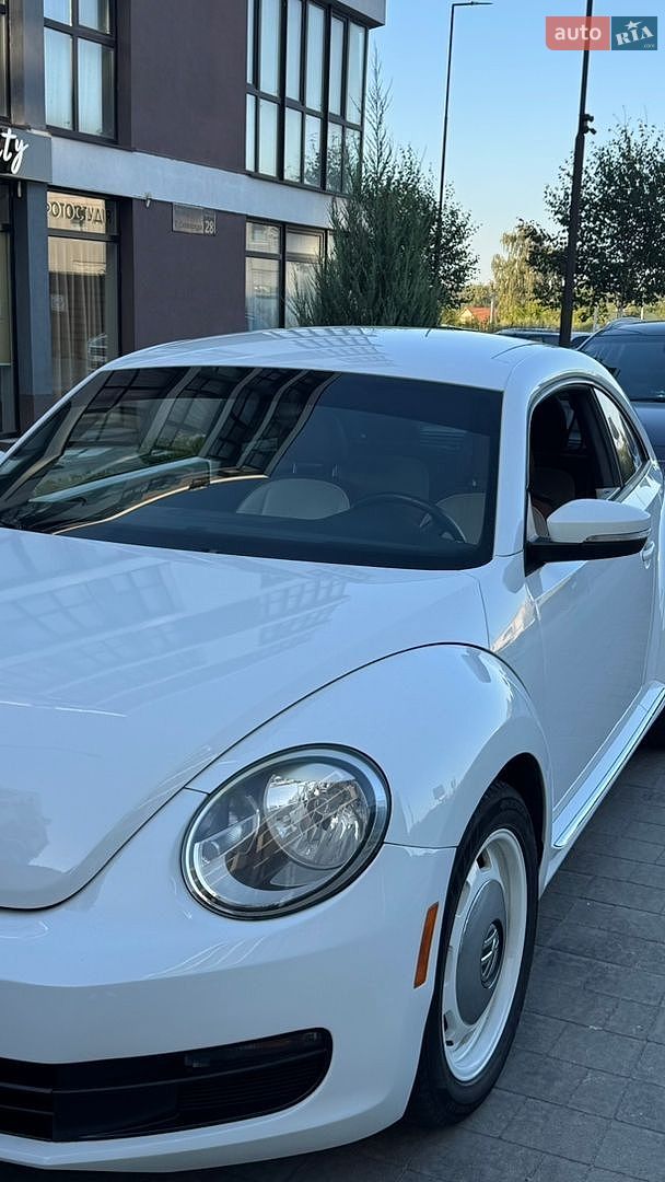 Volkswagen Beetle 2014 VIN 3VWF17ATXFM600701 фото оголошення 14 з 15