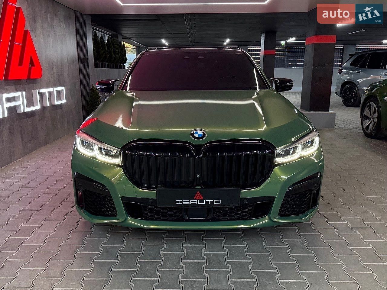 Bmw 740I 2015 VIN WBA7E2C51GG504705 фото оголошення 3 з 18