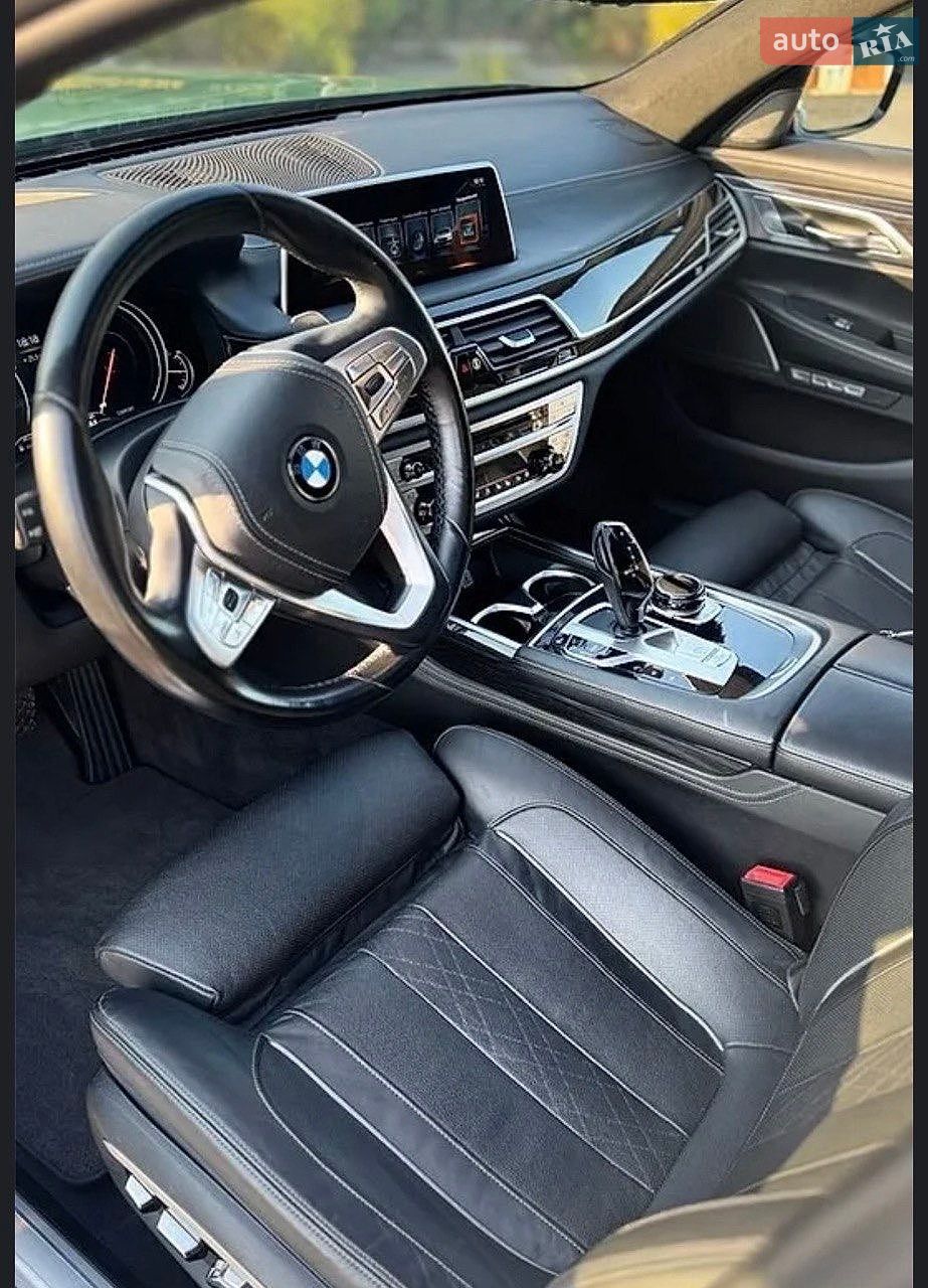 Bmw 740I 2015 VIN WBA7E2C51GG504705 фото оголошення 8 з 18