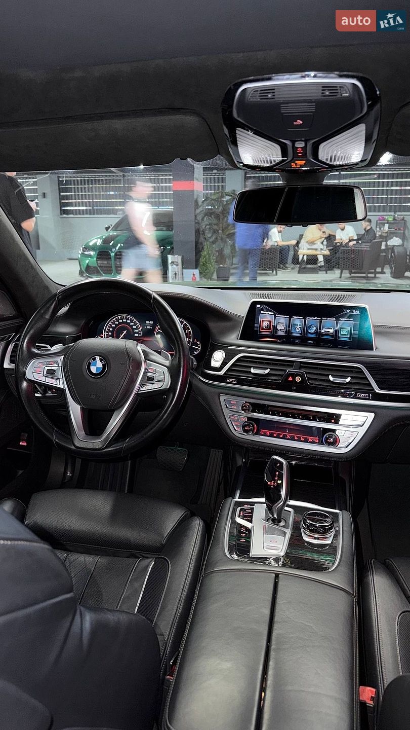 Bmw 740I 2015 VIN WBA7E2C51GG504705 фото оголошення 9 з 18