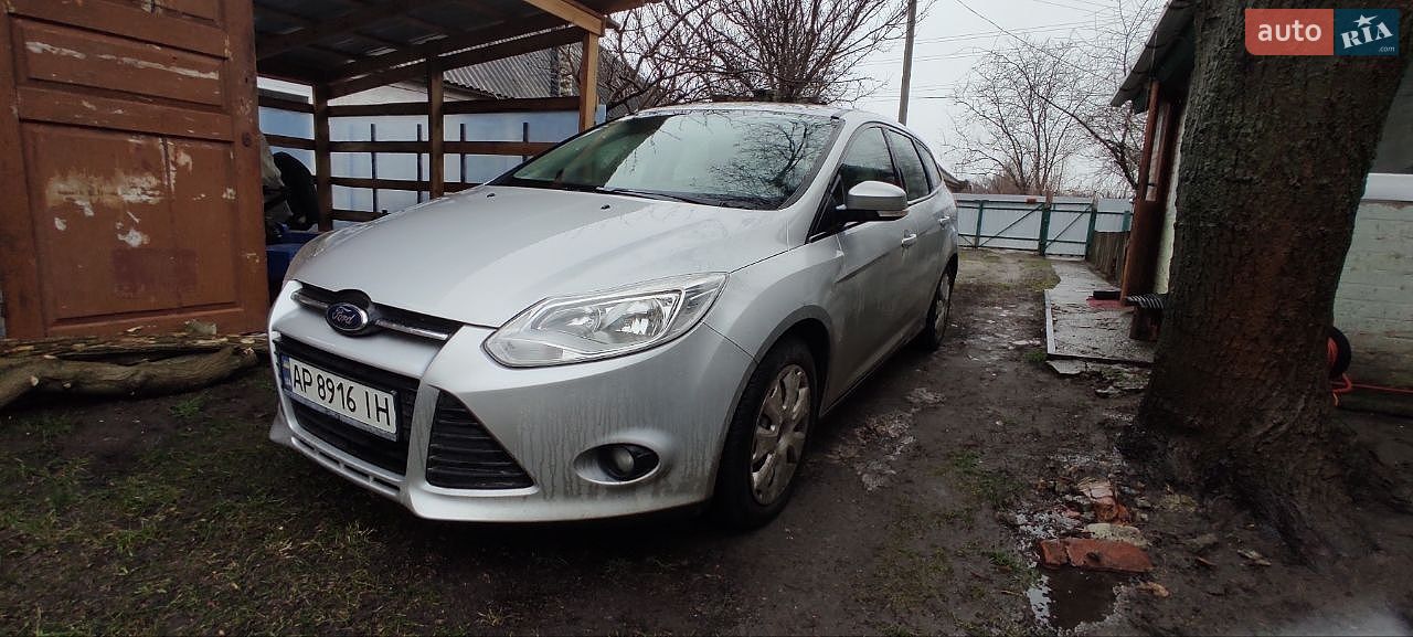 Ford Focus 2013 VIN WF0LXXGCBLDU70416 фото оголошення 4 з 19