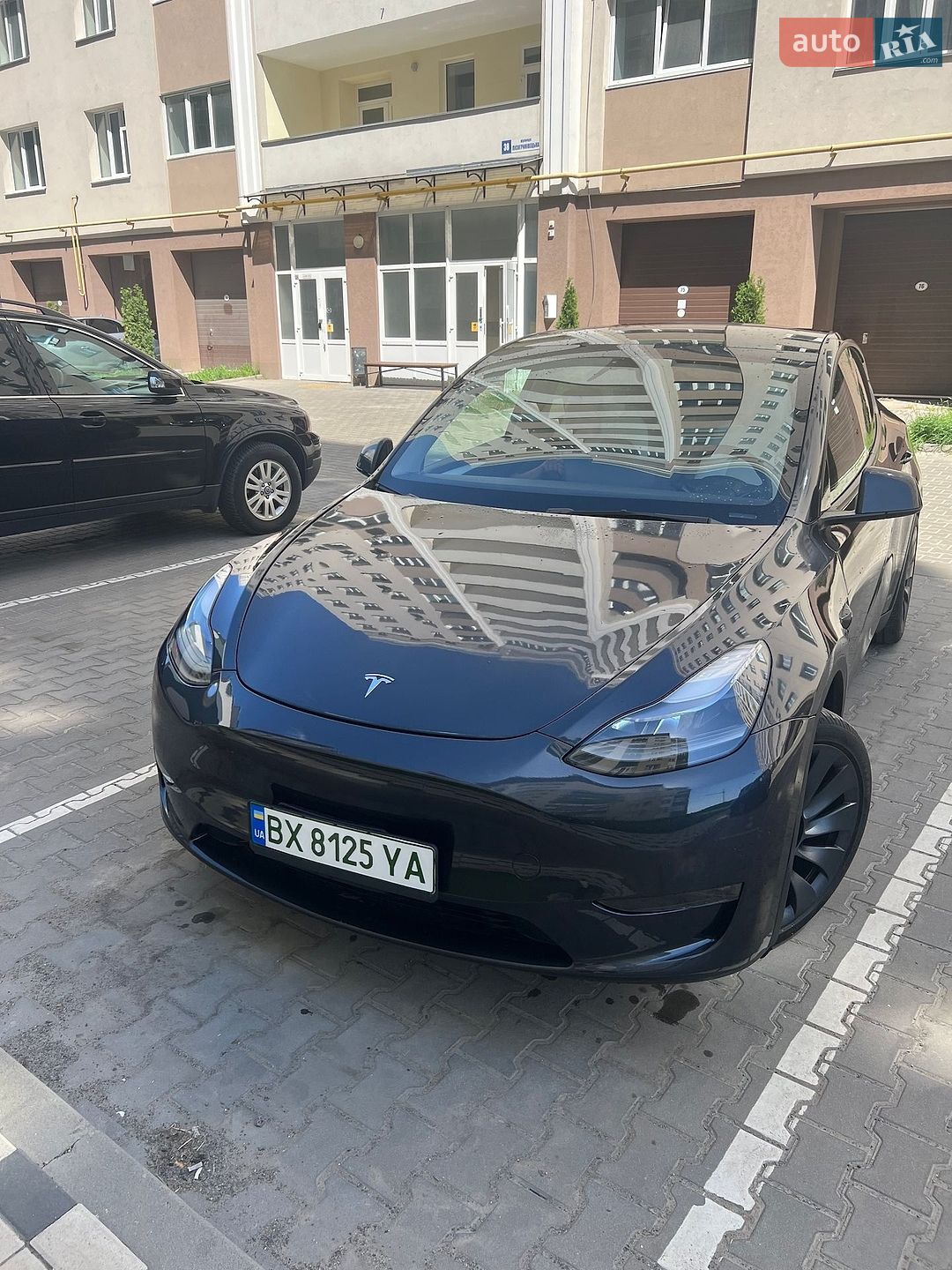 Tesla Model Y 2024 VIN 7SAYGDEE1RF080100 фото оголошення 5 з 29