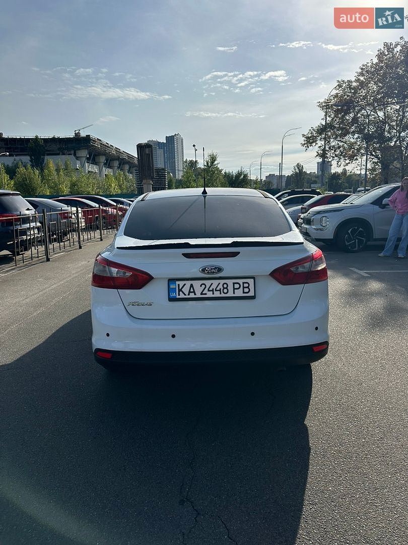 Ford Focus 2012 VIN WF0MXXGCBMCE88188 фото оголошення 2 з 9