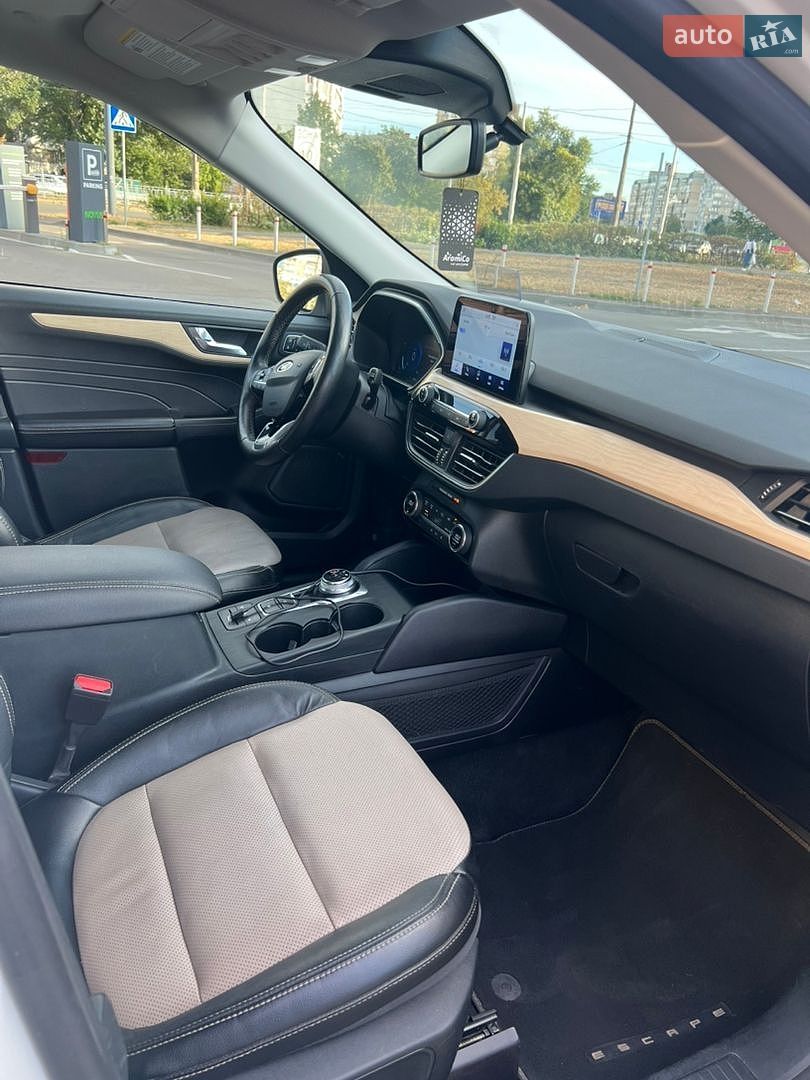 Ford Escape 2021 VIN 1FMCU9DZ6MUA44772 фото оголошення 14 з 21