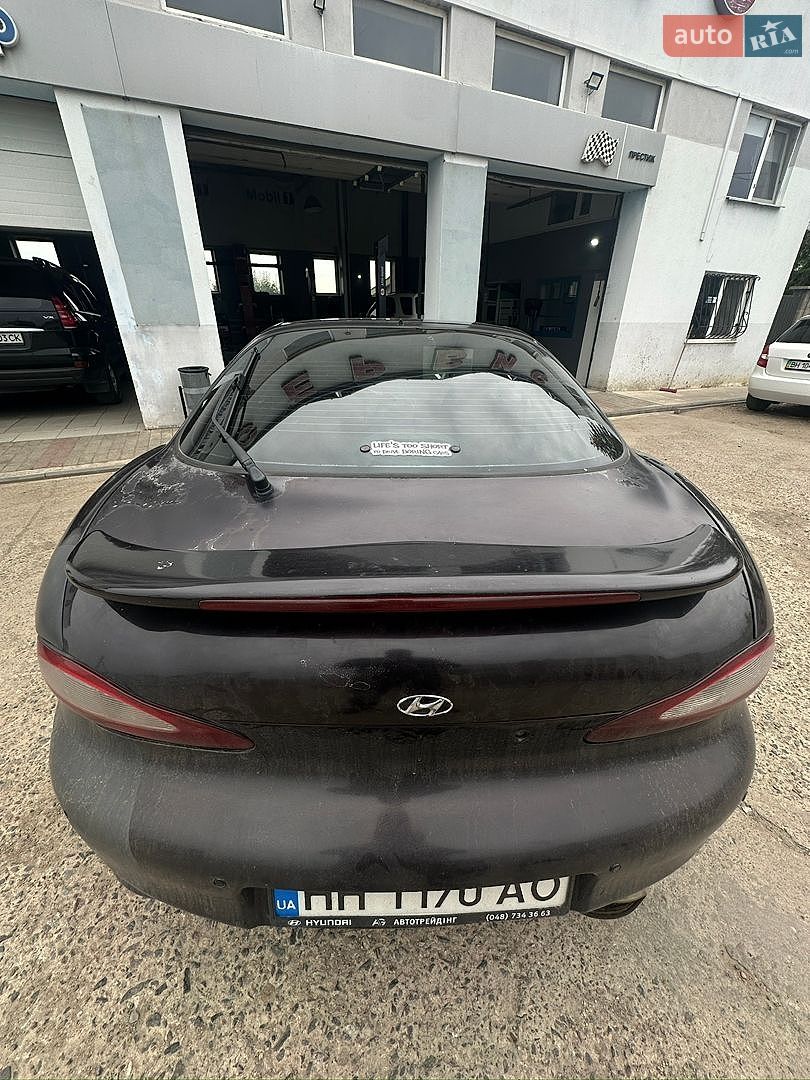 Hyundai Coupe 1997 VIN KMHJG31FPWU083698 фото оголошення 4 з 15