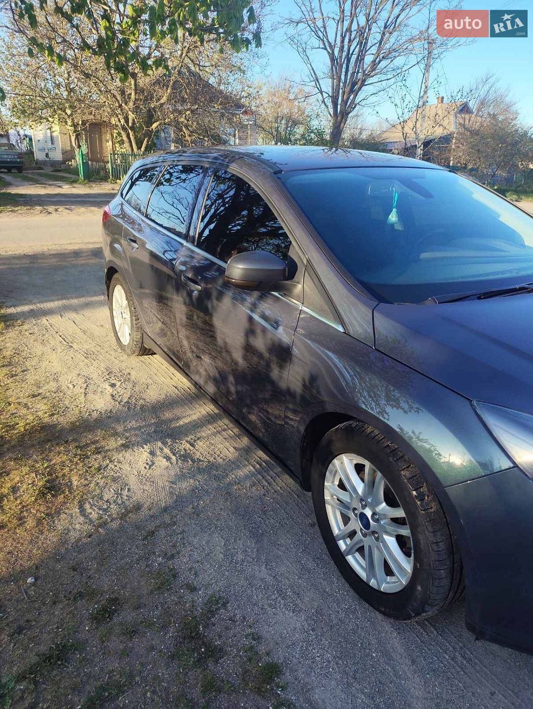 Ford Focus 2013 VIN WF0LXXGCBLDA18745 фото оголошення 2 з 24