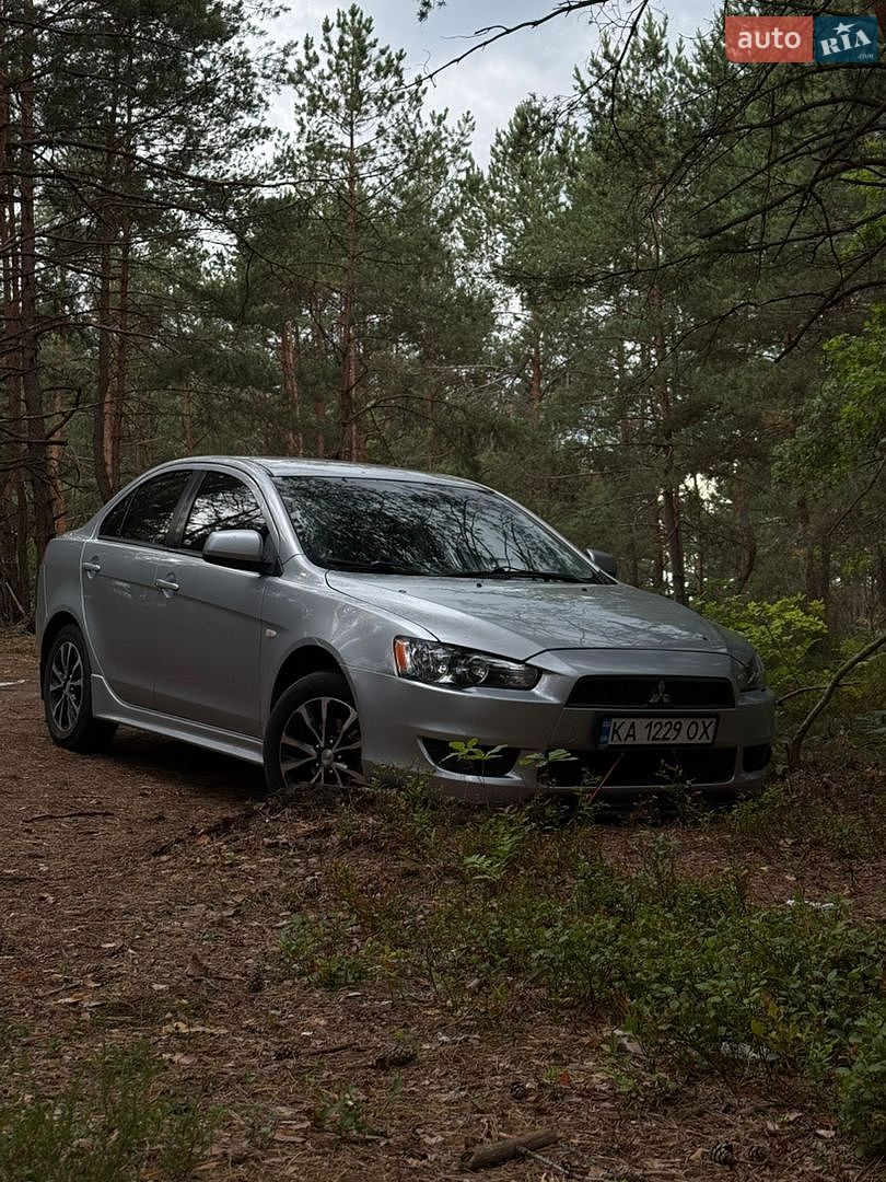 Mitsubishi Lancer 2009 VIN JMBSTCY4A9U002035 фото оголошення 4 з 9